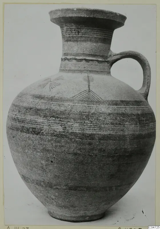 Pottery Bichrome III jug with a flaring neck, single handle and painted bands and linear motifs on the body
