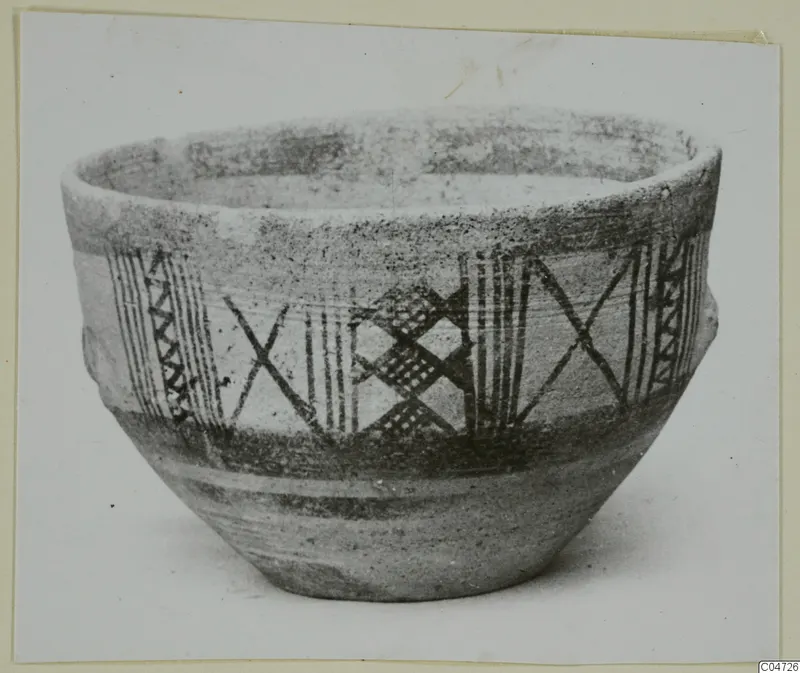 Bowl with dark painted hatched bands, crossed diagonal lines and chequered panels, catalogued as White Painted II, from Amathus