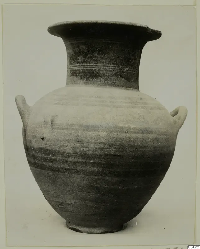 Pottery White Painted II jar from Amathus with a flared rim, two handles and a banded neck
