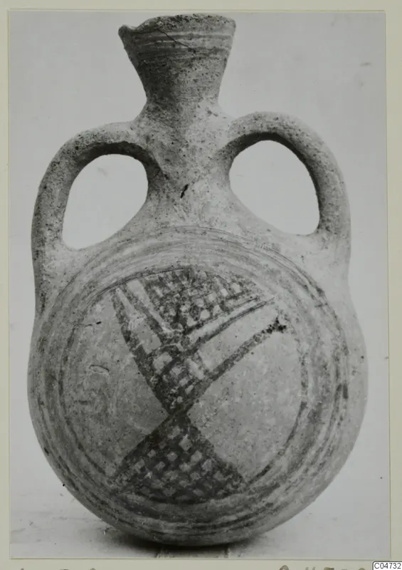 Two-handled jug from Amathus, Pottery Bichrome II, with dark painted bands and a crosshatched pattern on the body