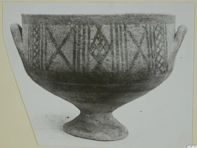 Pottery White Painted II bowl from Amathus, footed, with two small handles and painted cross and lattice bands