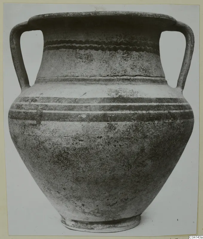 Pottery vessel White Painted III-1 from Amathus, with two loop handles and painted bands around the neck and body