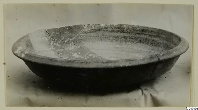Pottery Bichrome IV plate-jug from Amathus tombs 1–9, shown in three-quarter view on a plain surface