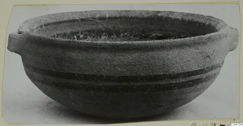 Pottery White Painted IV bowl with two small horizontal handles and two dark painted bands around the body