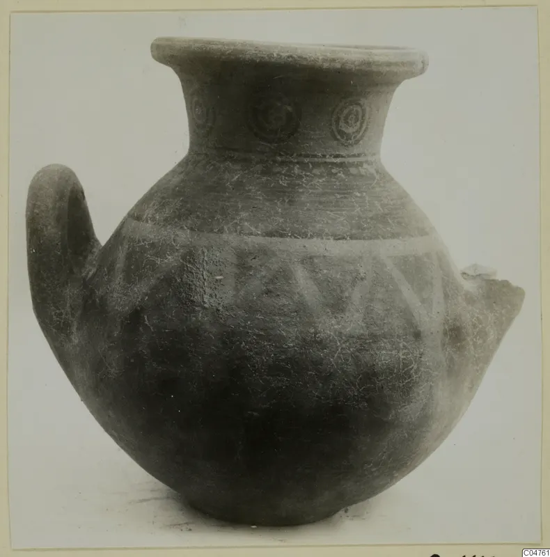 Pottery jug from Amathus with a single loop handle, concentric circle motifs on the neck and triangular bands on the body