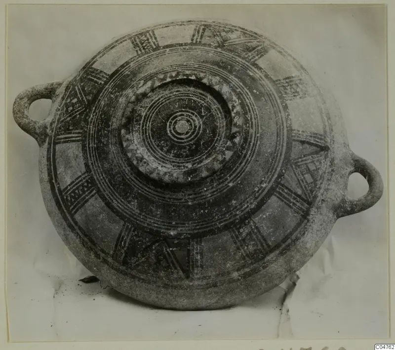 Pottery Bichrome III vessel from Amathus with two loop handles and radiating painted bands