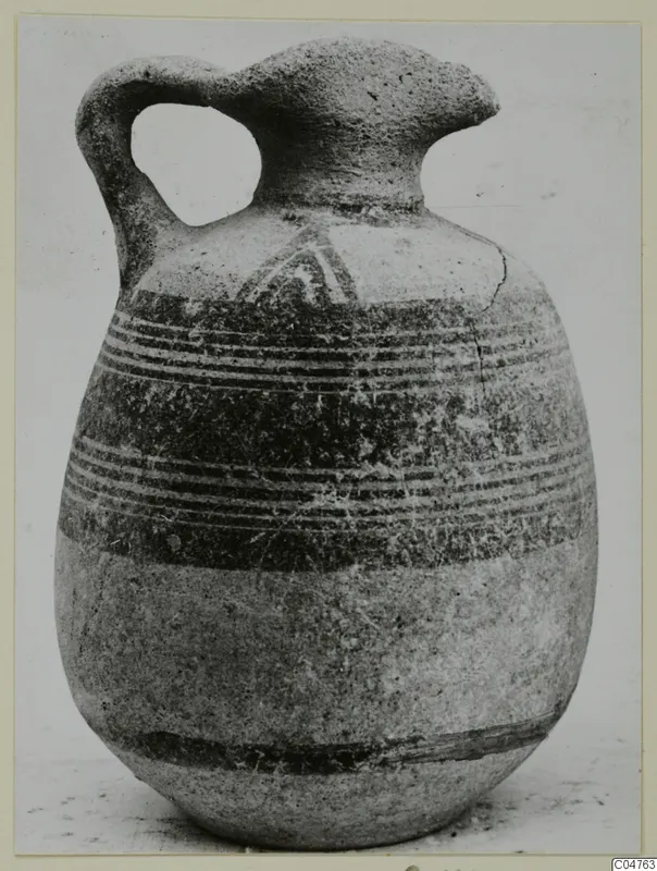 Pottery Bichrome III jug from Amathus with a strap handle and painted bands on the upper body