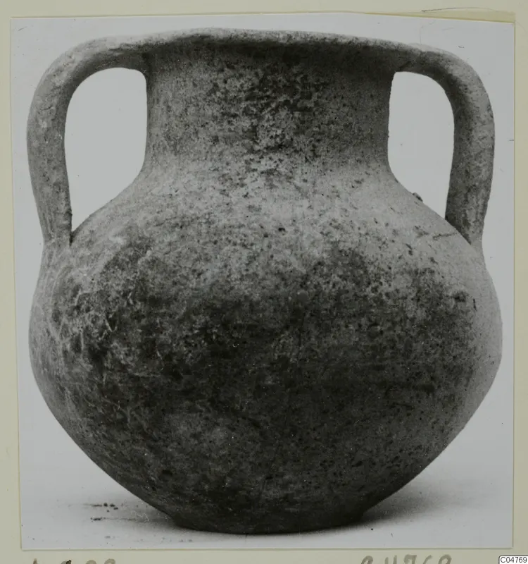 Plain white two-handled jar from Amathus with a globular body and short neck