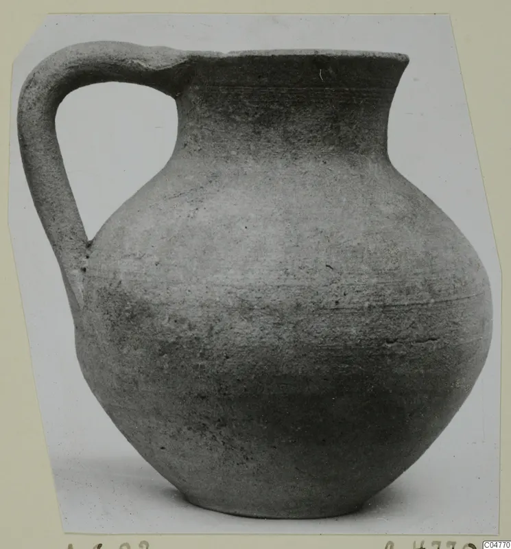 Pottery Plain White IV-V jug with a single loop handle, from Amathus, shown on a photo card