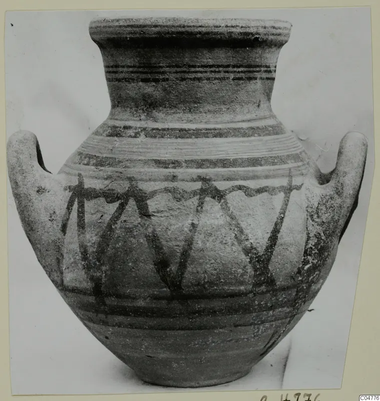 Two-handled jar from Amathus, Pottery Bichrome V, with dark painted bands and vertical strokes on the body