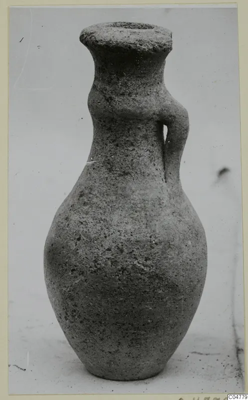 Jug of Pottery Bichrome IV from Amathus, with a flared rim and one strap handle