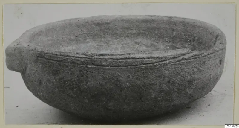 Pottery Plain White IV-V: a bowl with a handle, shown from the side, from Amathus