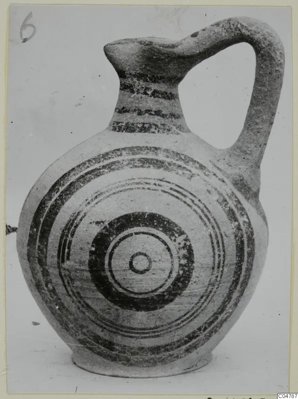 White Painted V jug from Amathus, with dark painted bands on the neck and concentric circles on the body