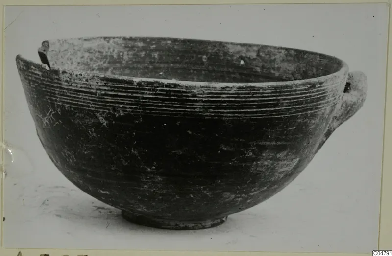 Pottery bowl with a single horizontal handle and grooves below the rim, from Amathus