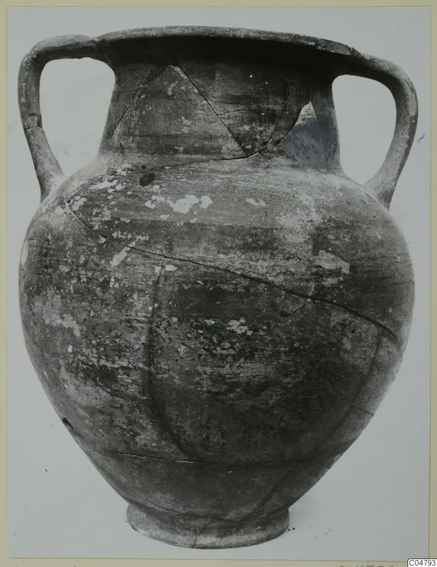 Two-handled pottery jar from Amathus, shown in side view against a plain background