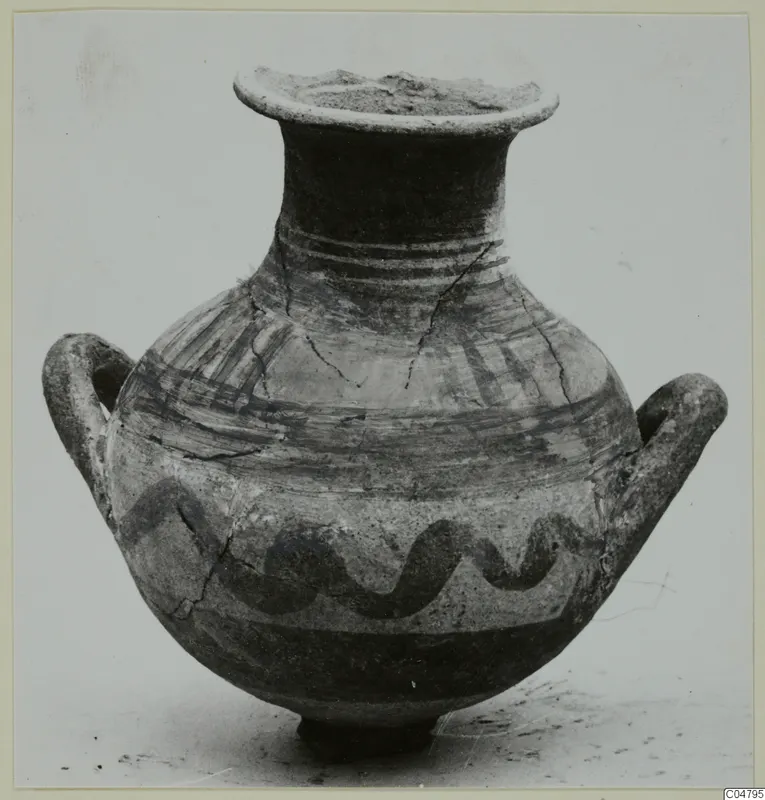 White Painted I amphora from Amathus with two handles, dark painted bands and a wavy line on a light body