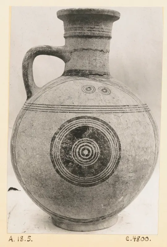 Pottery Bichrome III jug from Amathus, with painted bands and concentric circles on its body