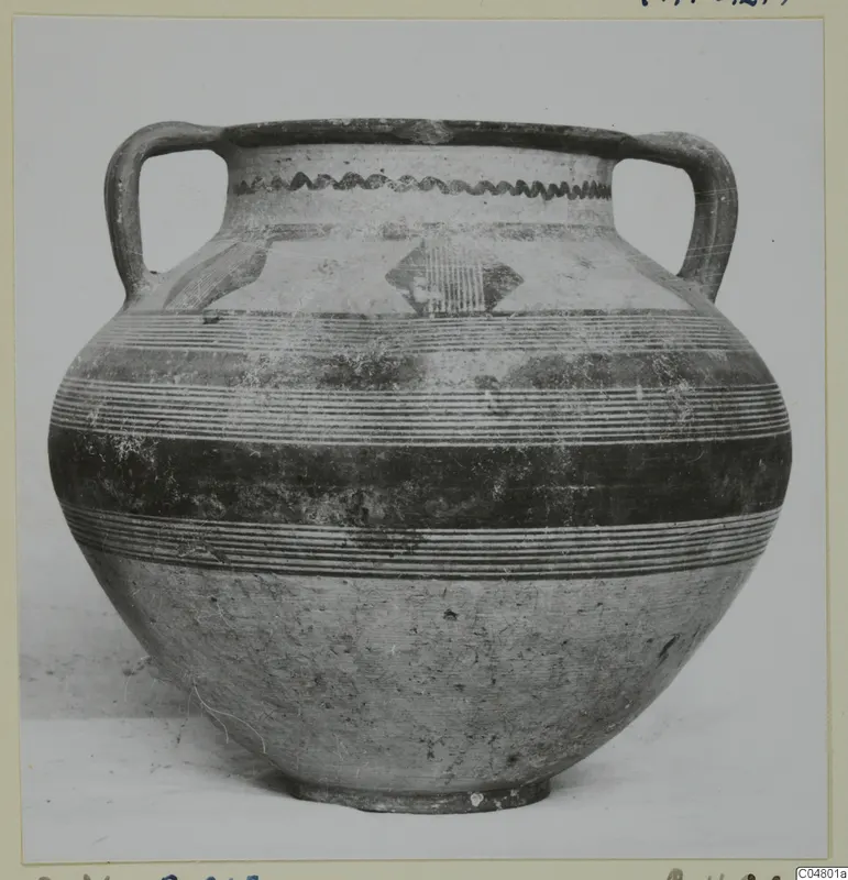 Two-handled painted jar, Bichrome III, with banded decoration and a wavy line below the rim