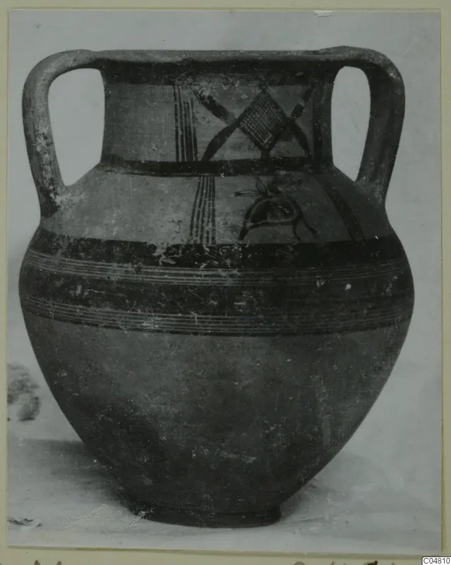 Two-handled painted pottery jar with dark bands and hatched motifs on the shoulder