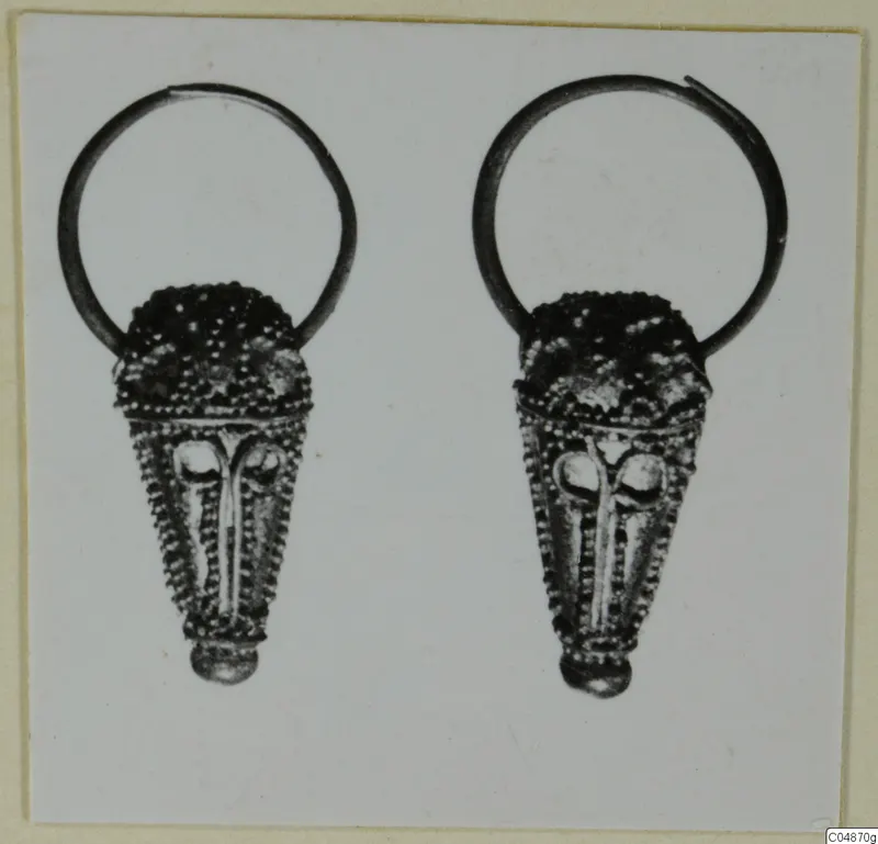 Two matching gold earrings with ring loops and conical, beaded bodies, from Enkomi