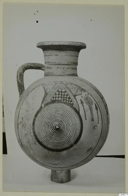 Jug from Pottery Bichrome IV with concentric circles and a checkered panel painted on its body