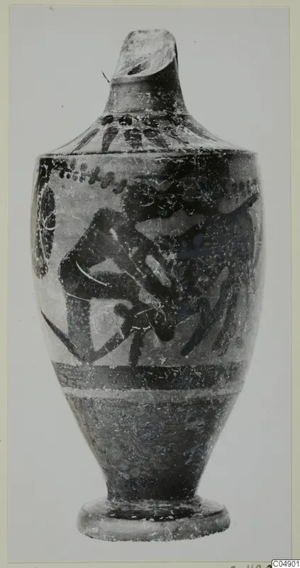 Black-figure pottery flask from Amathus with a painted scene of a figure and a shield