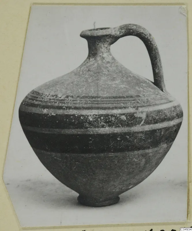 One-handled Bichrome-Red pottery jug with dark horizontal bands, from Marion