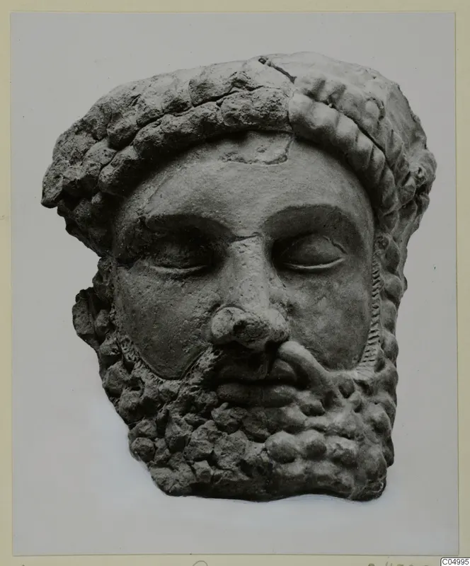 Bearded head in terracotta, facing forward, with a thick band of rounded curls across the top of the head