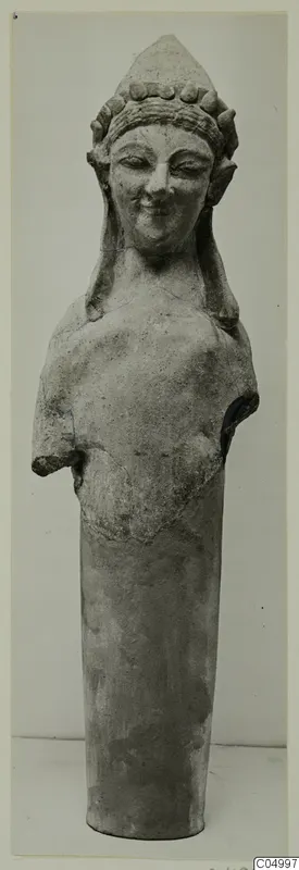 Terracotta statue from Mersinaki, head and upper body with the arms broken away