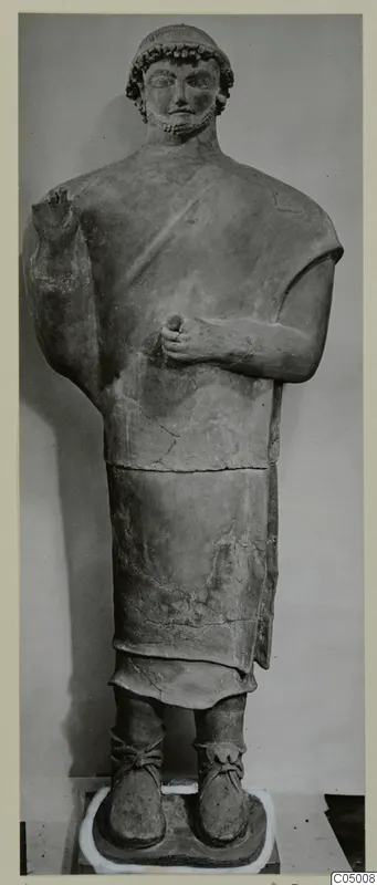 Standing male terracotta statue with curled hair and beard, from Mersinaki