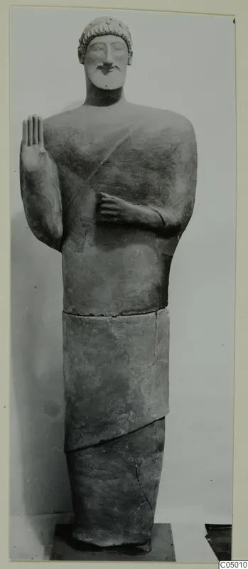 Life-size terracotta statue of a bearded man raising his right hand, from Mersinaki.