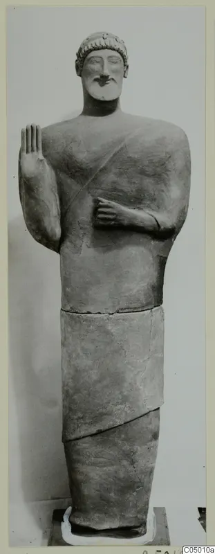 Full-length statue of a bearded man with his right hand raised, from Mersinaki