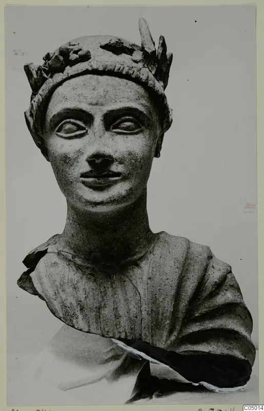 Sculpted bust of a figure with a leafy wreath on the head, shown from the front