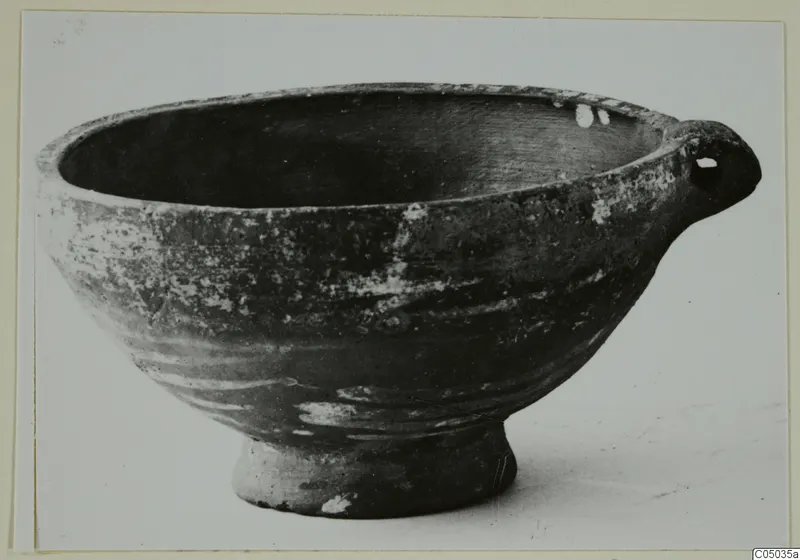 Base-Ring Ware cup from Enkomi with a single horizontal handle, seen from the side