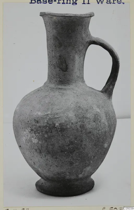 Base-Ring Ware jug from Enkomi with a single strap handle and a flared rim