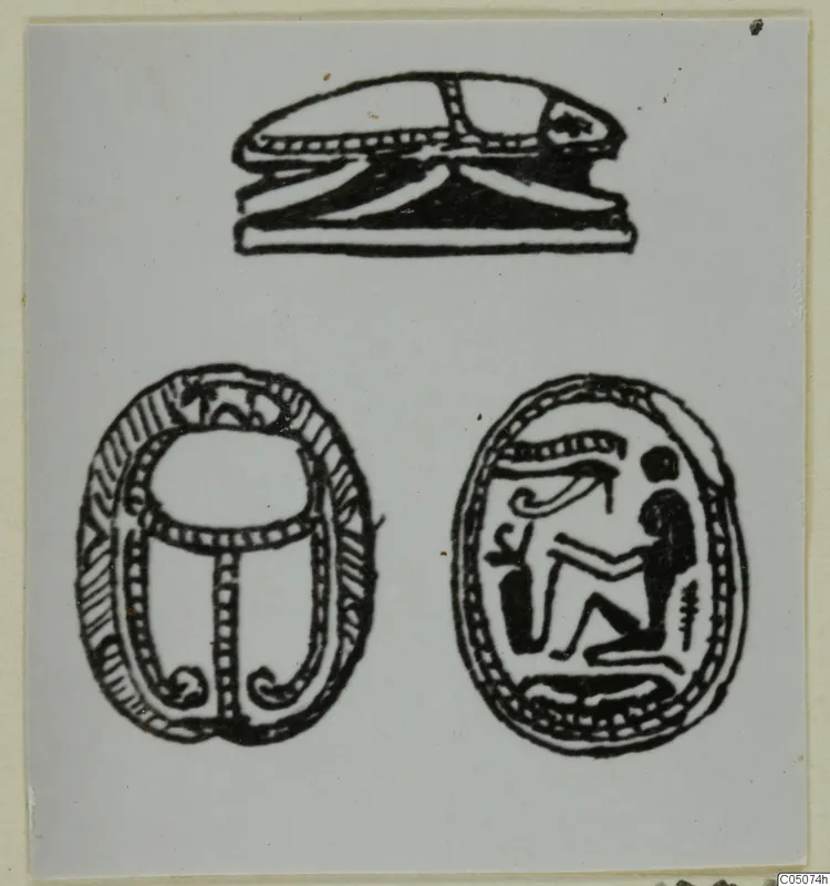 Line drawing of a scarab in three views: side profile, back, and an incised base with a seated figure and an eye motif.