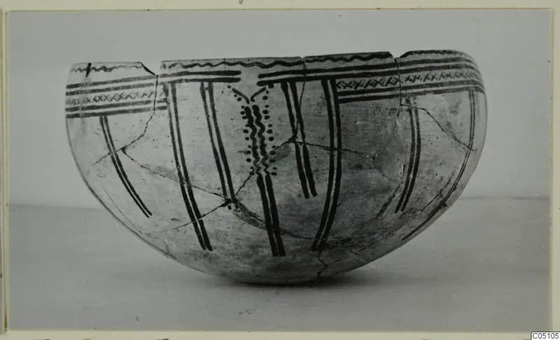 White Slip Ware bowl from Enkomi with black painted bands and vertical strokes