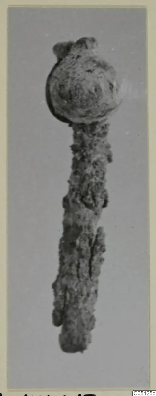 Corroded iron pin with a rounded head, from the Kastros tombs at Lapithos
