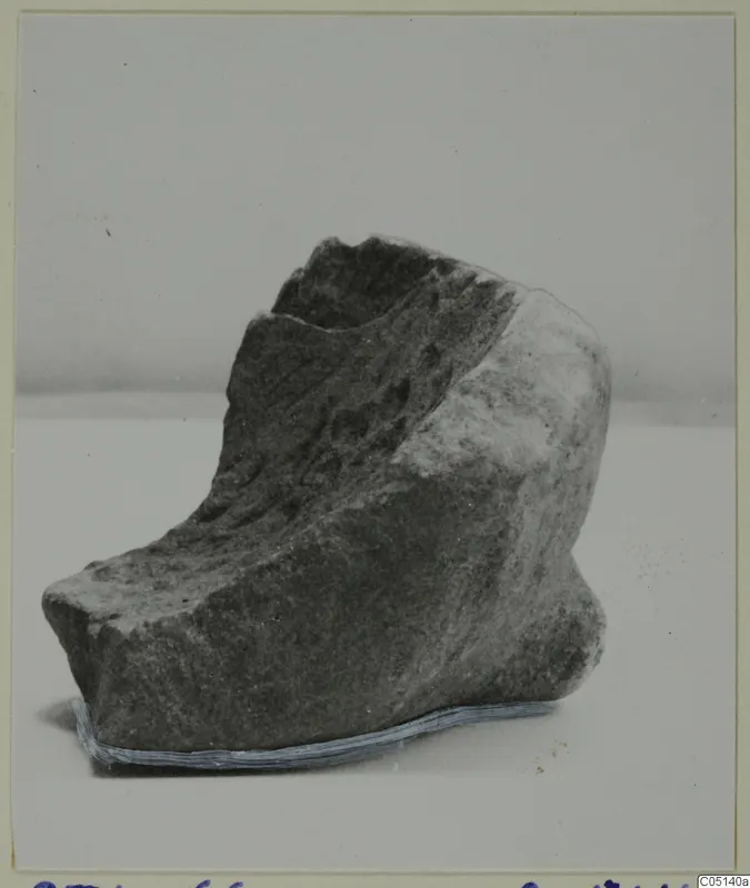 Fragment of a worked stone object from Petra tou Limniti.