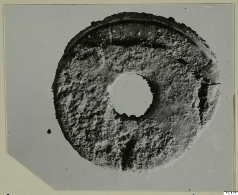 Bone disc with a central hole, find from the Kastros tombs at Lapithos
