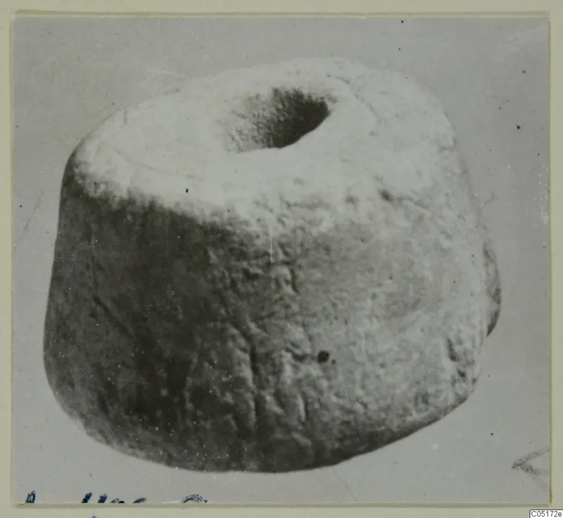 Rounded object with a central hole, from Lapithos, Kastros tombs