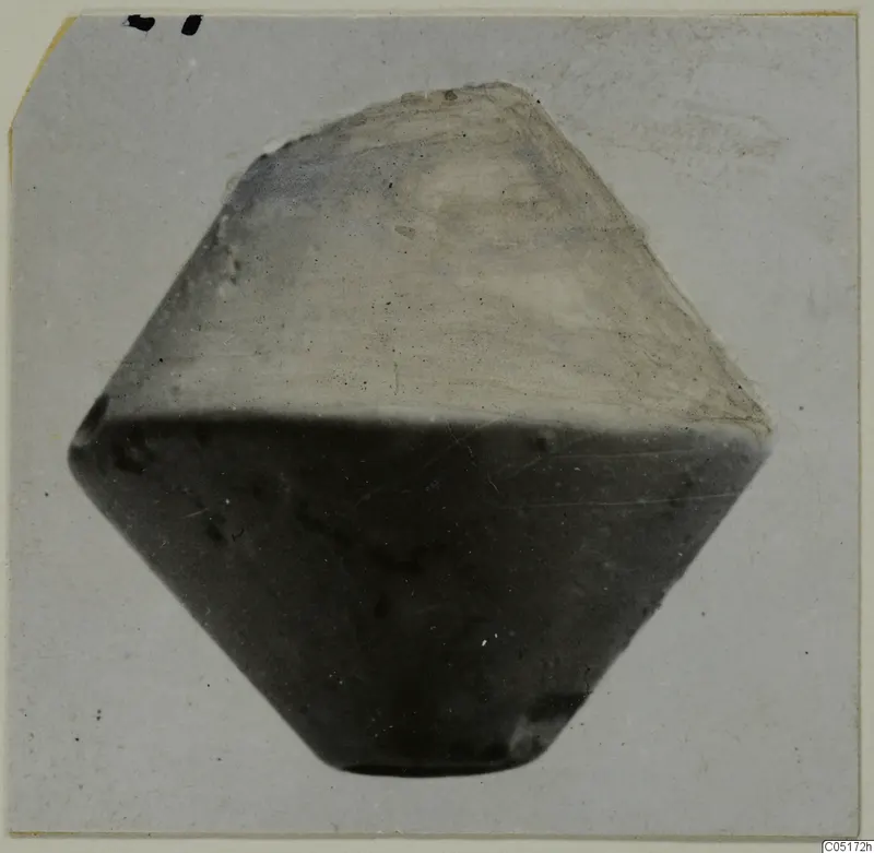 Stone spindle whorl from Lapithos, shown against a plain light background