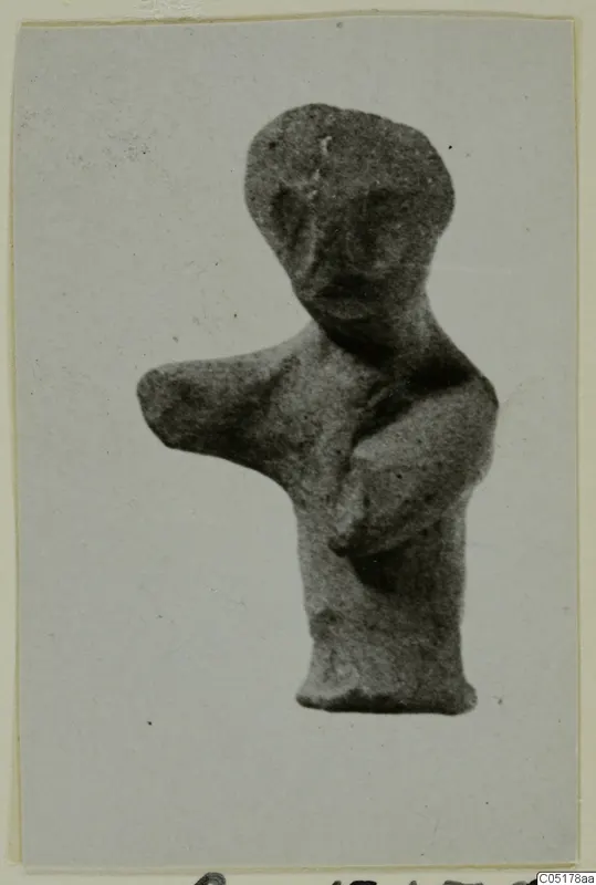 Terracotta figurine of a human figure, Minor Plastic 3, with one arm stretched out to the side