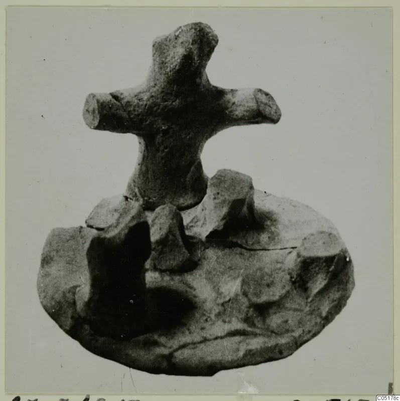 Terracotta Minor Plastic 3, a small terracotta figure with a cross-shaped top on a lumpy base