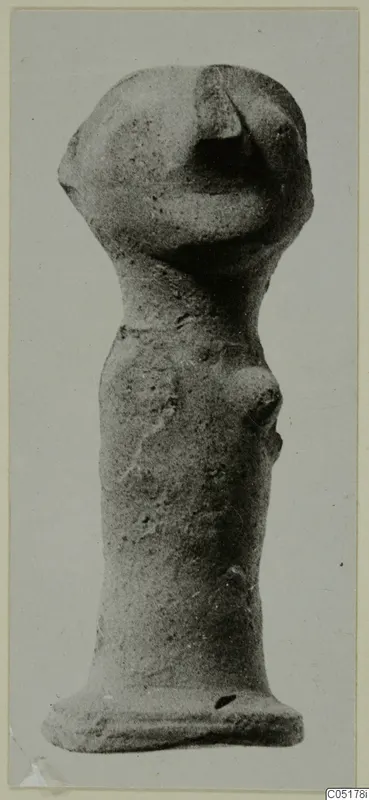 Terracotta figurine with a large head and cylindrical body, from the Ayios Iakovos series