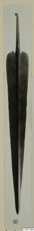 Long metal blade with a curled tang, find from Lapithos Tomb 315 B-C