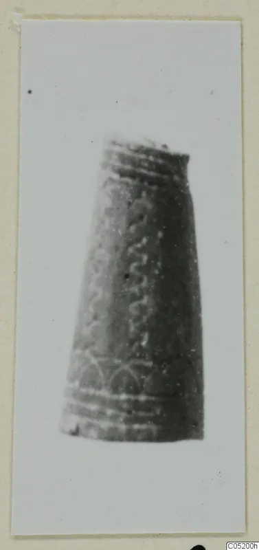 Tapering decorated object from Enkomi Tomb 3, shown in a mounted print