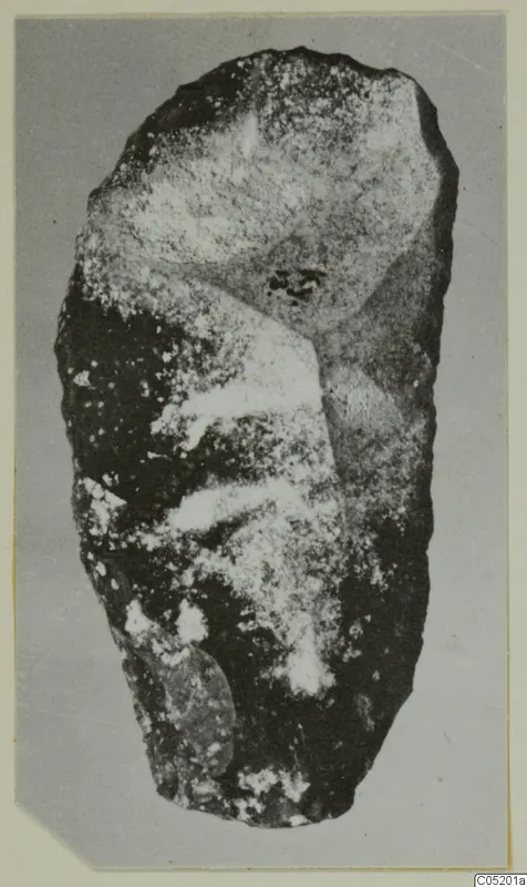 Stone scraper from Kythrea, elongated with pale speckled patches on its surface