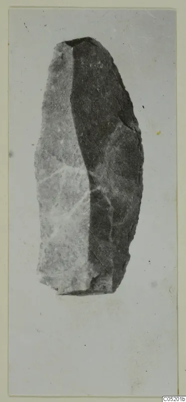 Stone knife from Kythrea, photographed on a pale background.