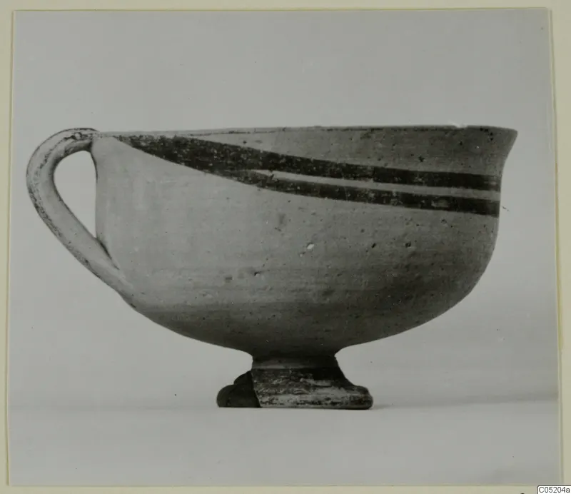 Pottery White Painted I bowl with one loop handle and two dark painted bands near the rim